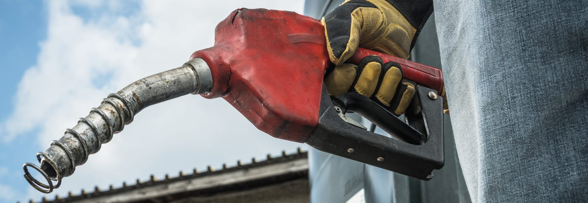 men-hold-diesel-pump-nozzle-in-his-hand-2026-01-08-07-24-41-utc